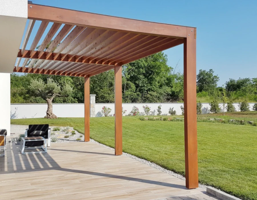 Timber pergola with climbing plants over seating area in Bedford